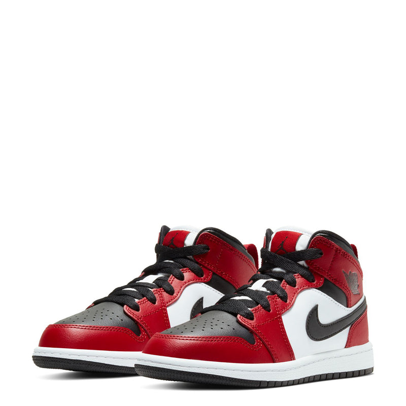 Pair of kids Air Jordan 1 Mid sneakers, red black white mid-top lace-up