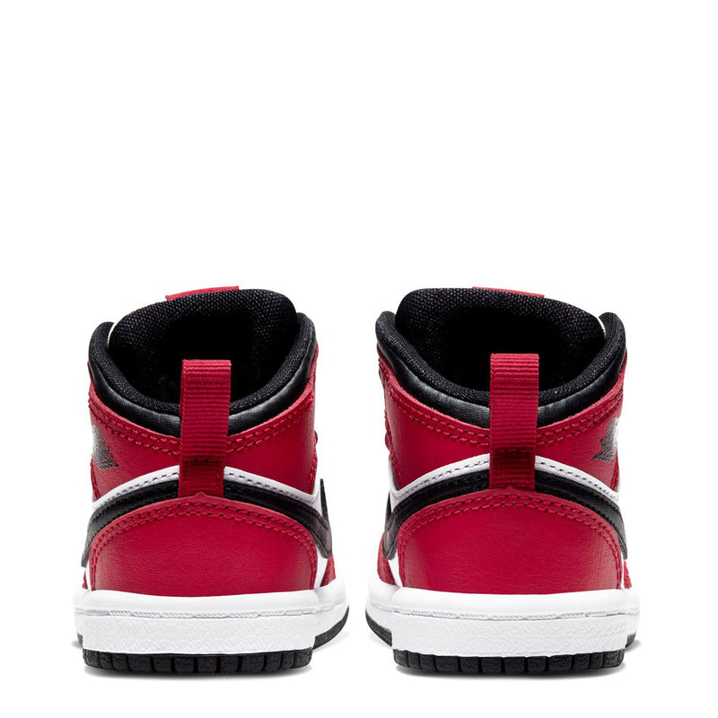 Toddler mid-top sneakers, back view: red heel with black collar and white stripe.