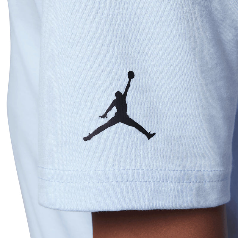 Light blue T-shirt hem with black Jordan jumpman silhouette