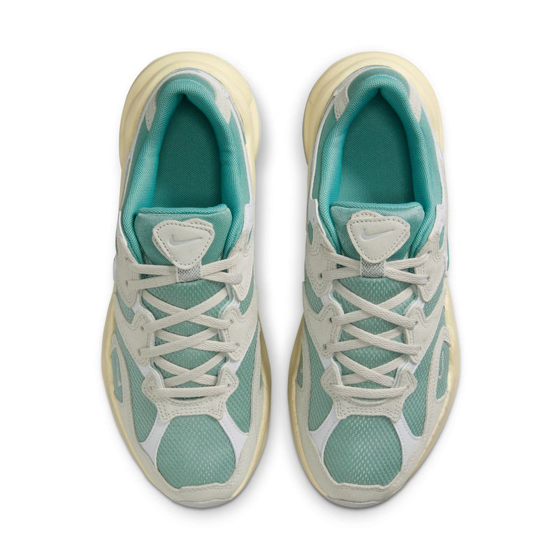 Women's sneakers, front view with teal lining and light gray lace-up upper