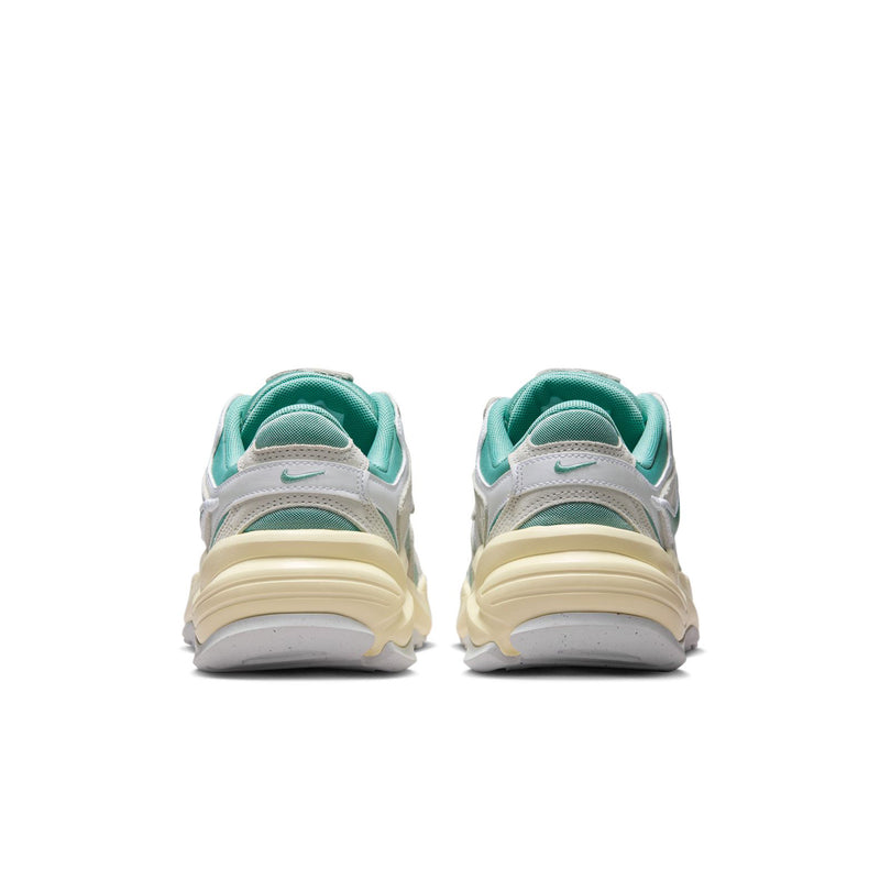 Women's sneakers, heel view with teal collar and off-white midsole