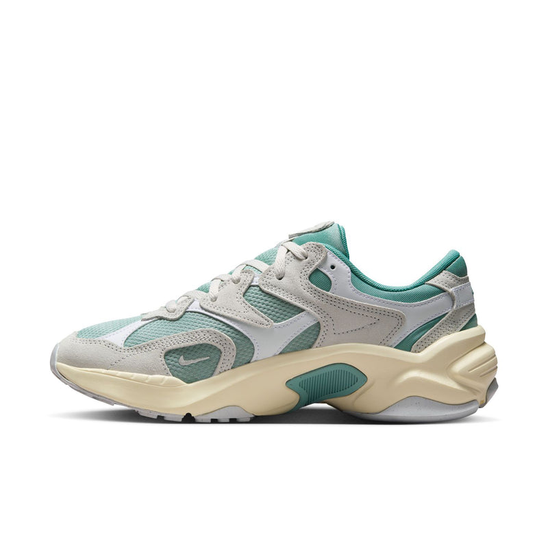 Women's running sneakers, angled side view in light gray and teal with cream accents