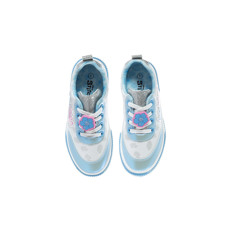 Kids light blue court sneakers, top view, showing lace-up front and stitched cartoon patch