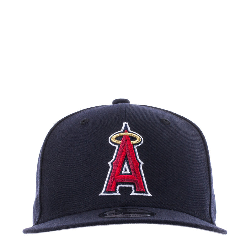Navy baseball cap with red and white "A" embroidered logo