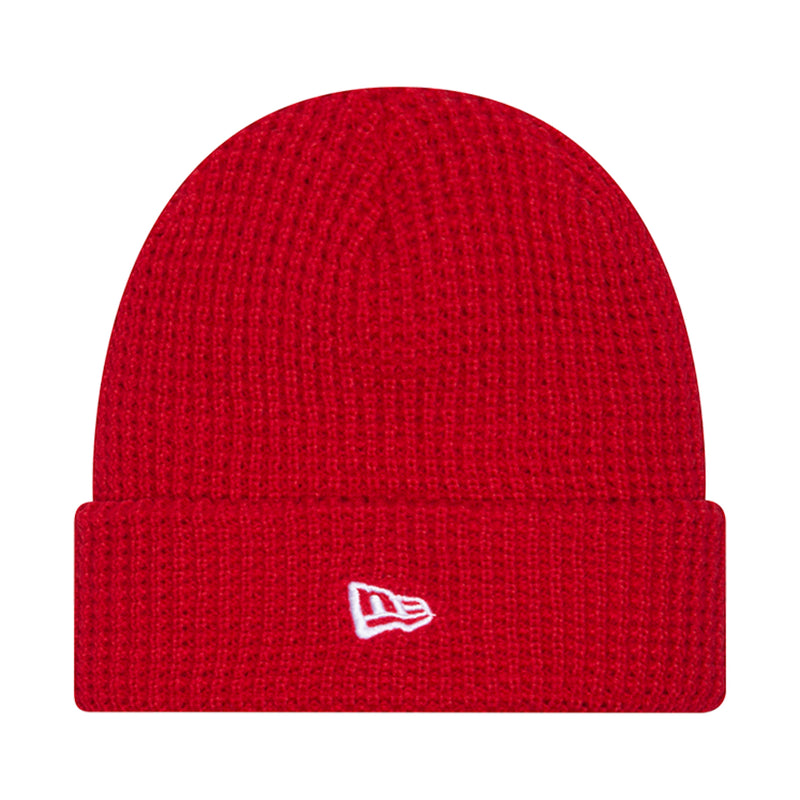 Red knit waffle beanie with small book logo