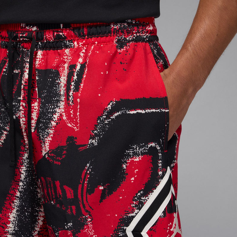 Men's red and black diamond-print shorts with bold black patterning and white trim