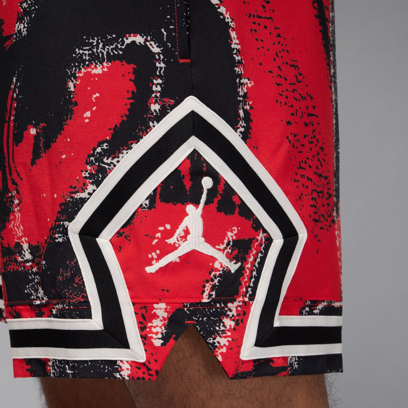 Men's red/black shorts with large diamond emblem and white-trimmed hem