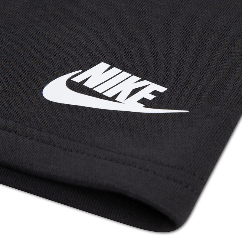 Dark shorts with white Nike logo on the leg