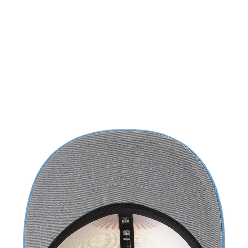 Gray interior cap panel with black sweatband and white label