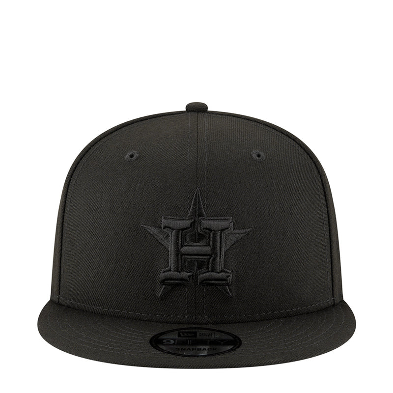 Black baseball cap with embroidered team logo on front