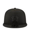 Black baseball cap with embroidered team logo on front
