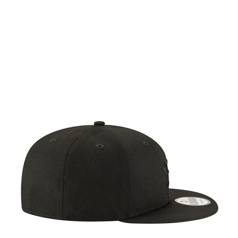 Black baseball cap side view with curved brim