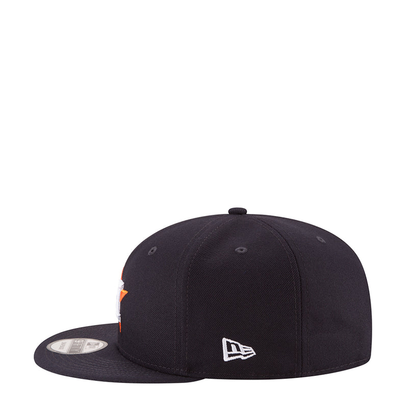 Navy baseball cap with New Era logo on front and orange side embroidery