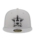 Grey snapback baseball cap with black cracked-style crown graphic on front