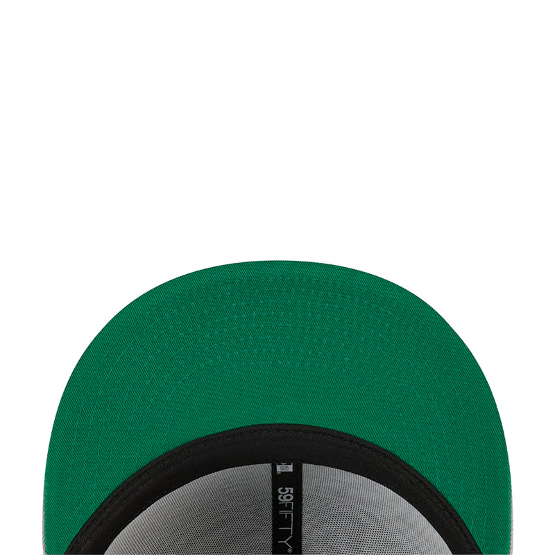 Green baseball cap crown with black inner band and 5950 label