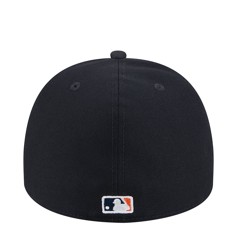 Dark navy baseball cap back with MLB logo patch near hem