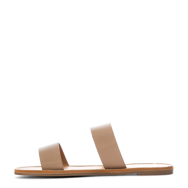 Tan two-strap womens slide sandal with flat sole and open toe