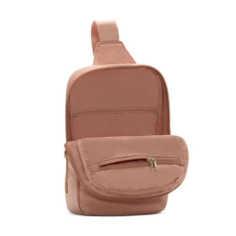 Rose gold crossbody sling bag with top strap and front zip compartment