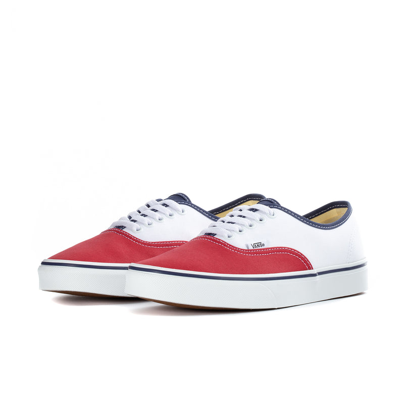 Pair of men's Vans low-top sneakers, red and white uppers with blue accents