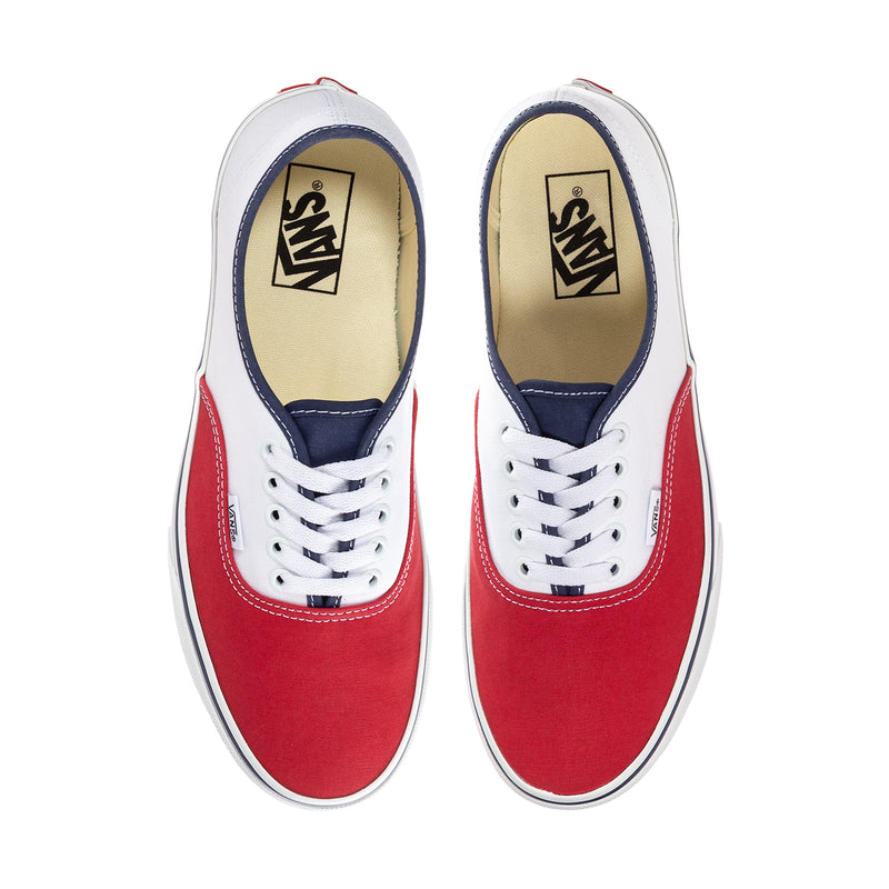 Men's Vans low-top sneakers with red sides, white toe, and lace-up front