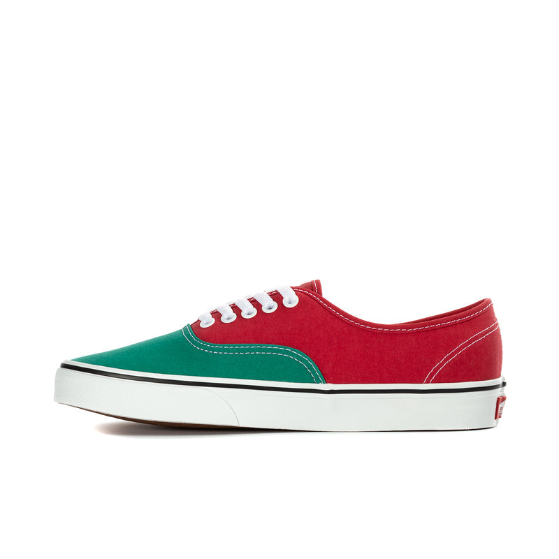 Men's low-top sneakers with red upper, green side panel, and white stitching and laces.