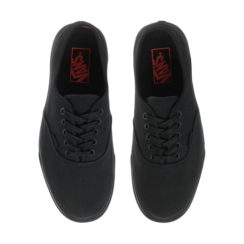 Men's black canvas lace-up sneakers with red logo on the tongue