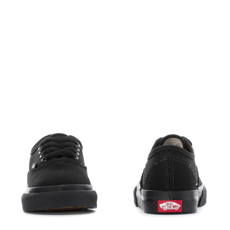Toddler black low-top sneakers, heel and back view with Vans logo patch