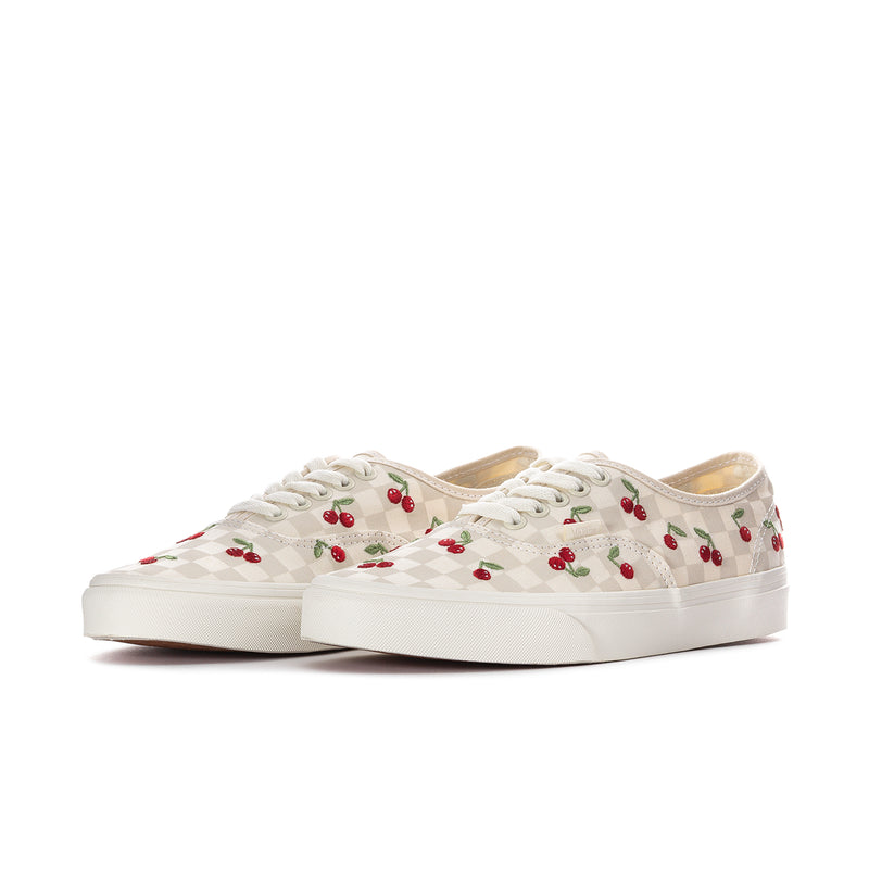 Women’s cherry print low-top sneakers, side-by-side view with white rubber sole