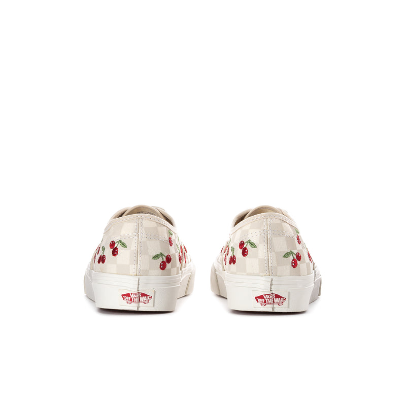 Women’s low-top sneakers from back view with red cherry print and white heel tab