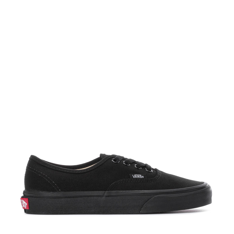 Black canvas youth sneakers, low-top lace-up with Vans logo and rubber sole