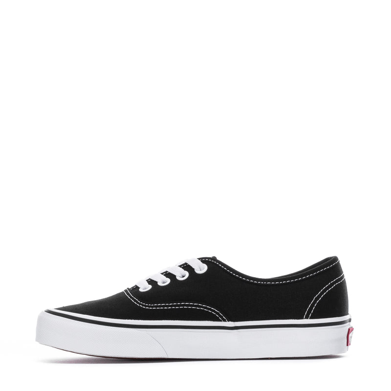 Black/white low-top canvas sneaker with white laces and side stitching