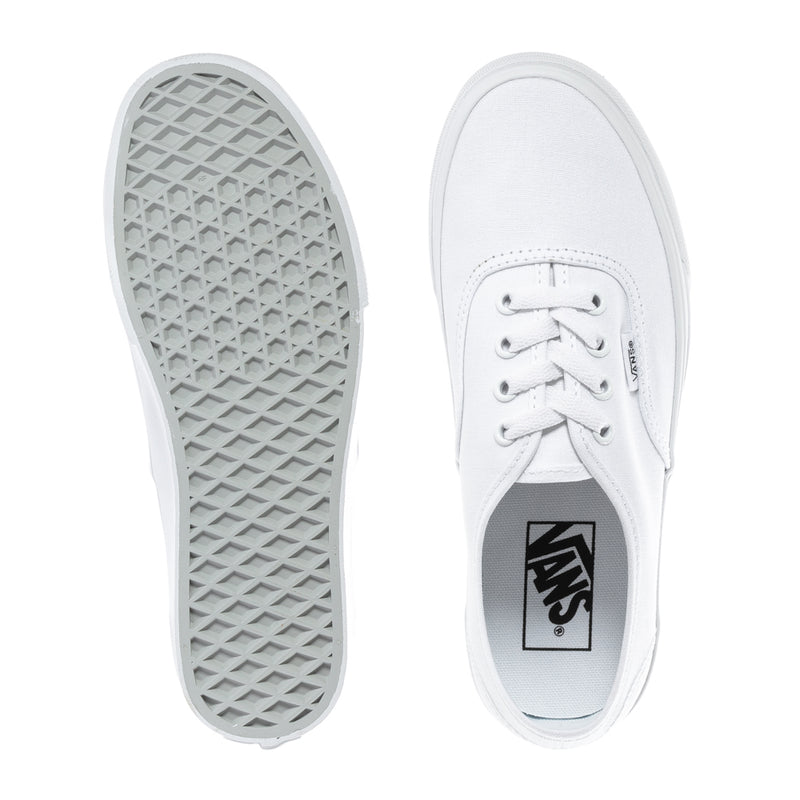Youth sneaker outsole and inner side view with VANS label on tongue