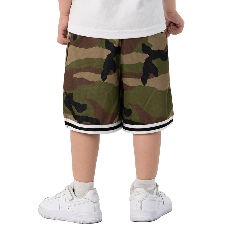 Youth camo basketball shorts back view, white-and-black hem trim