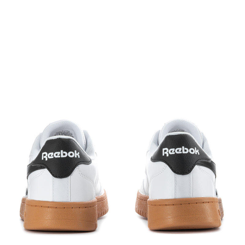 Reebok mens sneakers heel view, white with black Reebok tab and gum sole