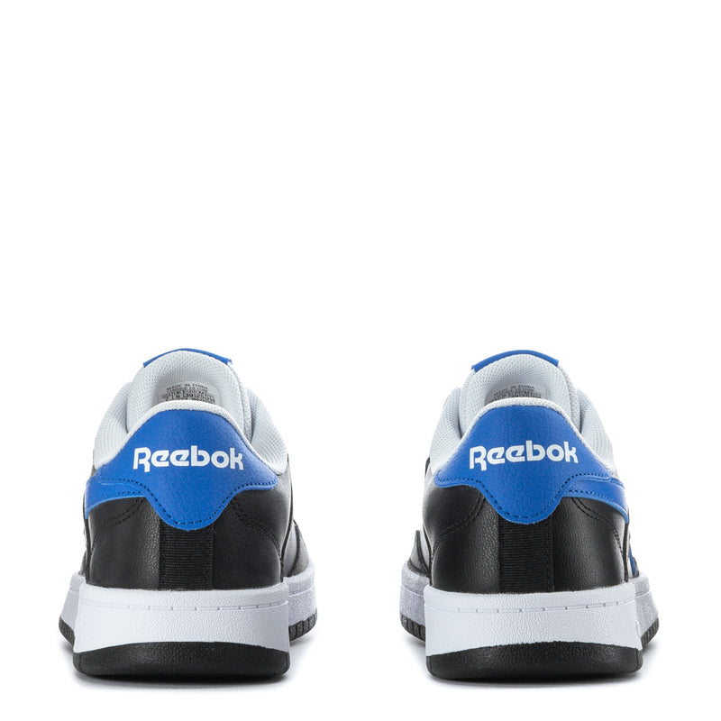 Men's Reebok sneakers heel view, black leather with blue heel tab and white sole