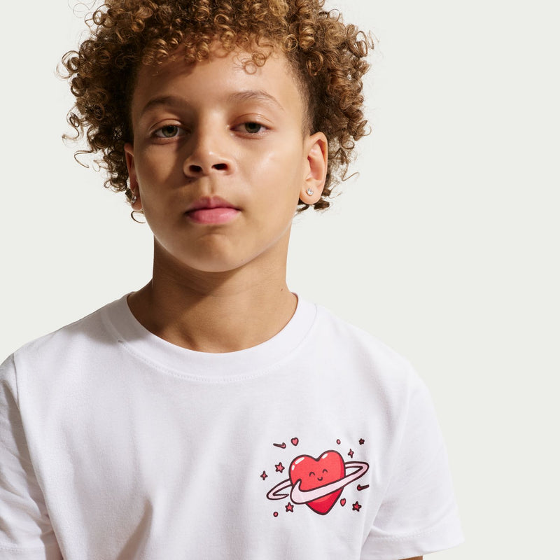 White youth crewneck T-shirt with red heart planet graphic and sparkle details