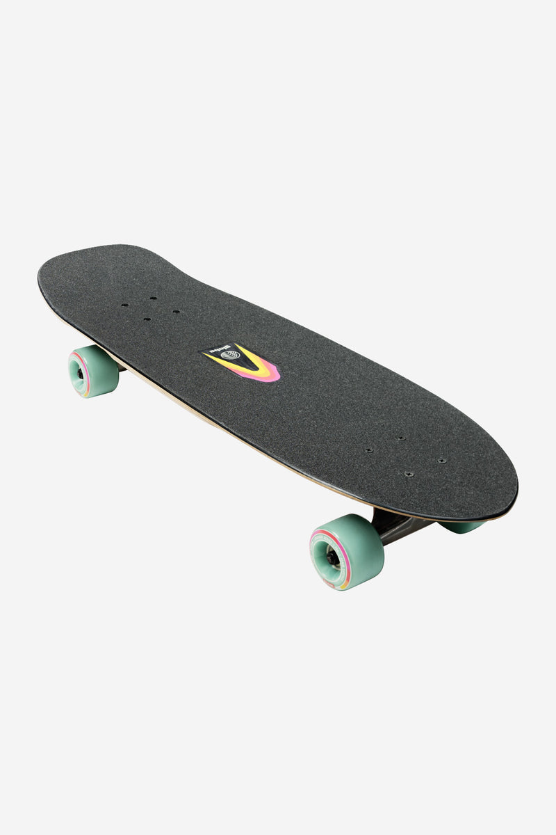 Angled view of the Blazer Fuego Cruiserboard 29 top deck with black grip tape and rainbow emblem at center