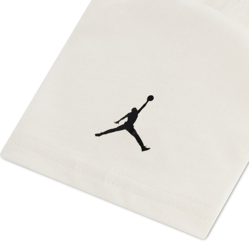 Kids ivory T-shirt back with small black Jordan silhouette logo