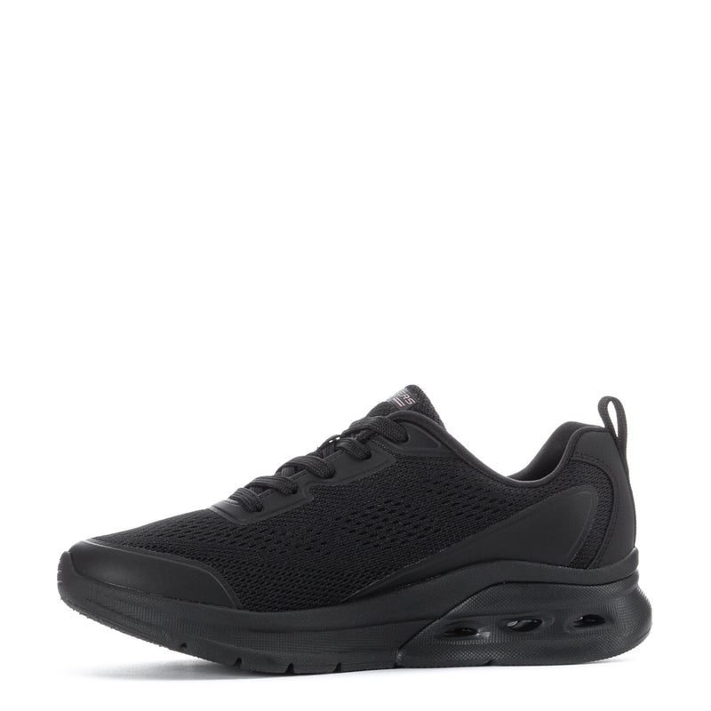 Women's black low-top lace-up sneakers, side view with padded collar