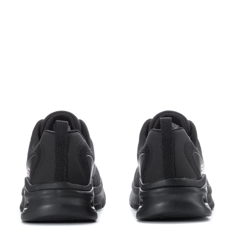 Women's black lace-up sneakers, rear view with padded heel and pull tab