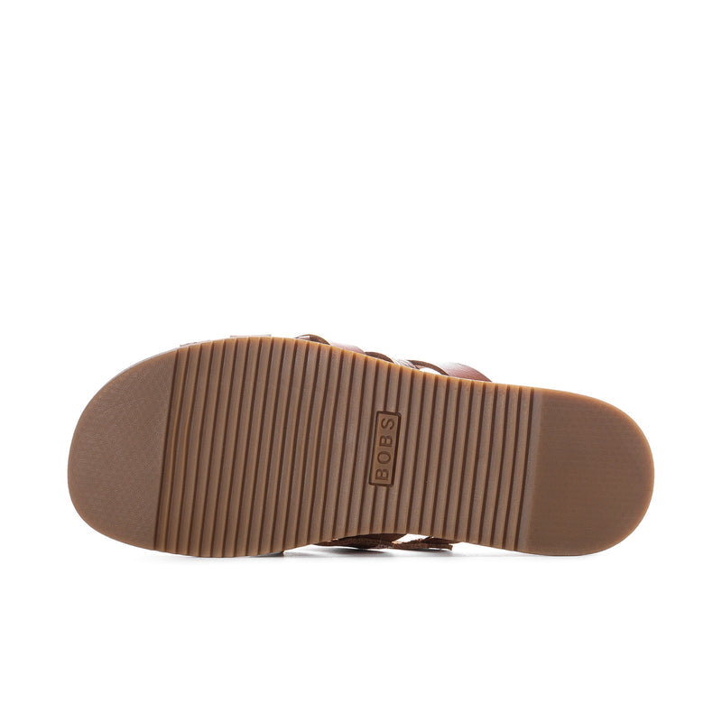 Chestnut slide sandal outsole view with ribbed traction and Bobs logo on heel