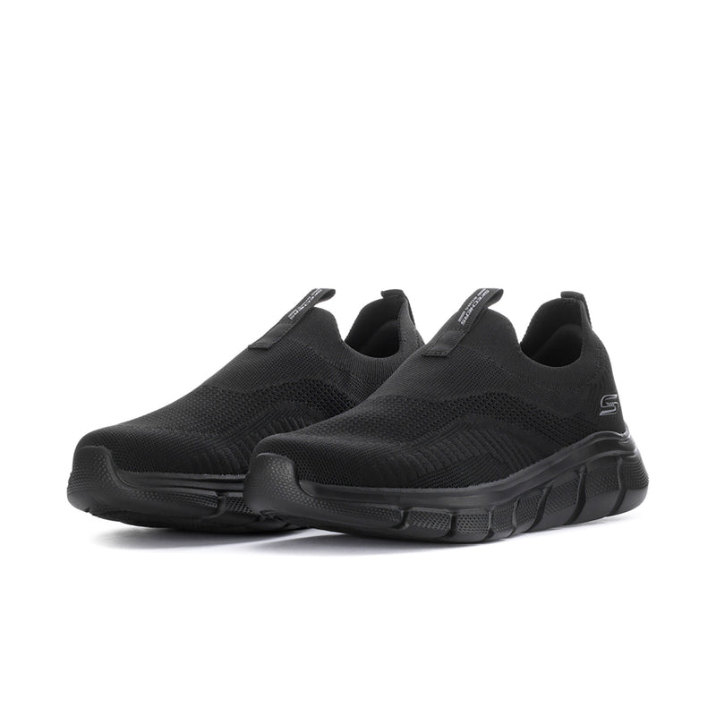 Men's black slip-on sneaker, side view, breathable knit upper and grippy outsole