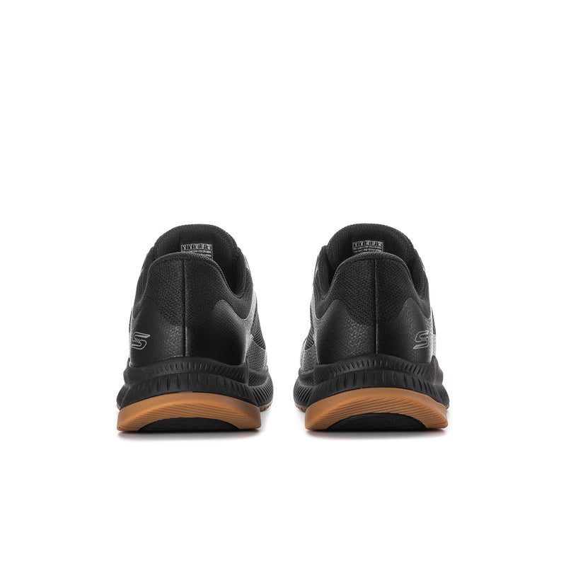 Men's black slip-on sneakers with padded collar and gum-toned outsole