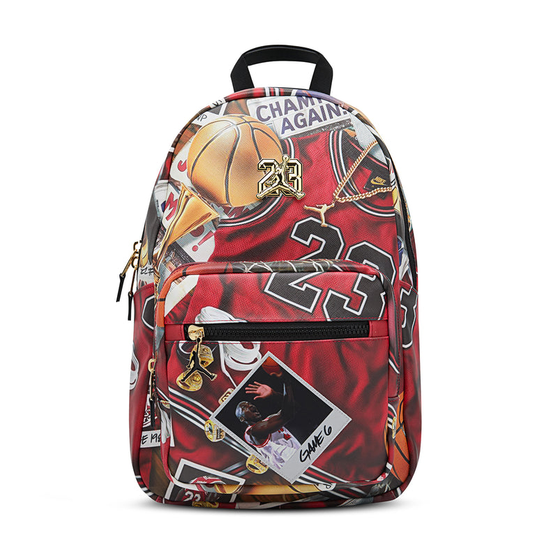 Multi-color GFX backpack with front zipper pocket and black top handle