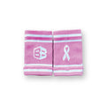 Pink wristbands for crossfit with a logo and breast cancer awareness ribbon on a white background