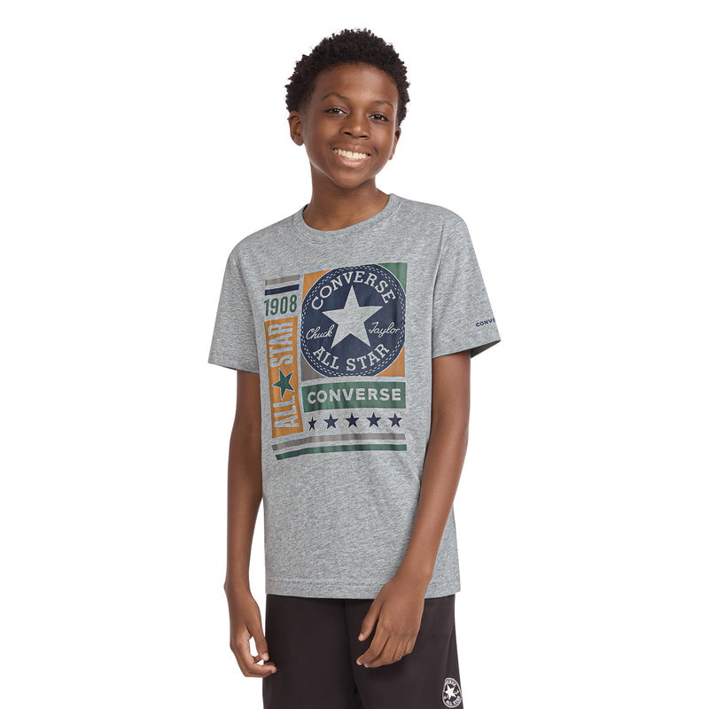 Youth dark grey heather T-shirt on model, Converse All Star chest graphic