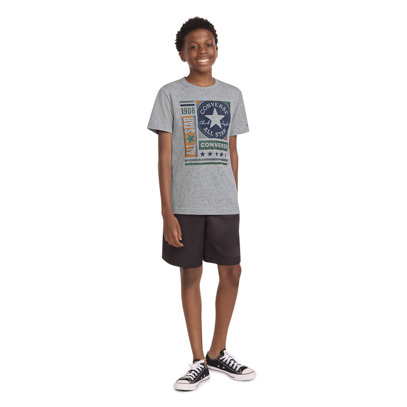 Youth dark grey heather T-shirt with Converse All Star chest print, worn with shorts