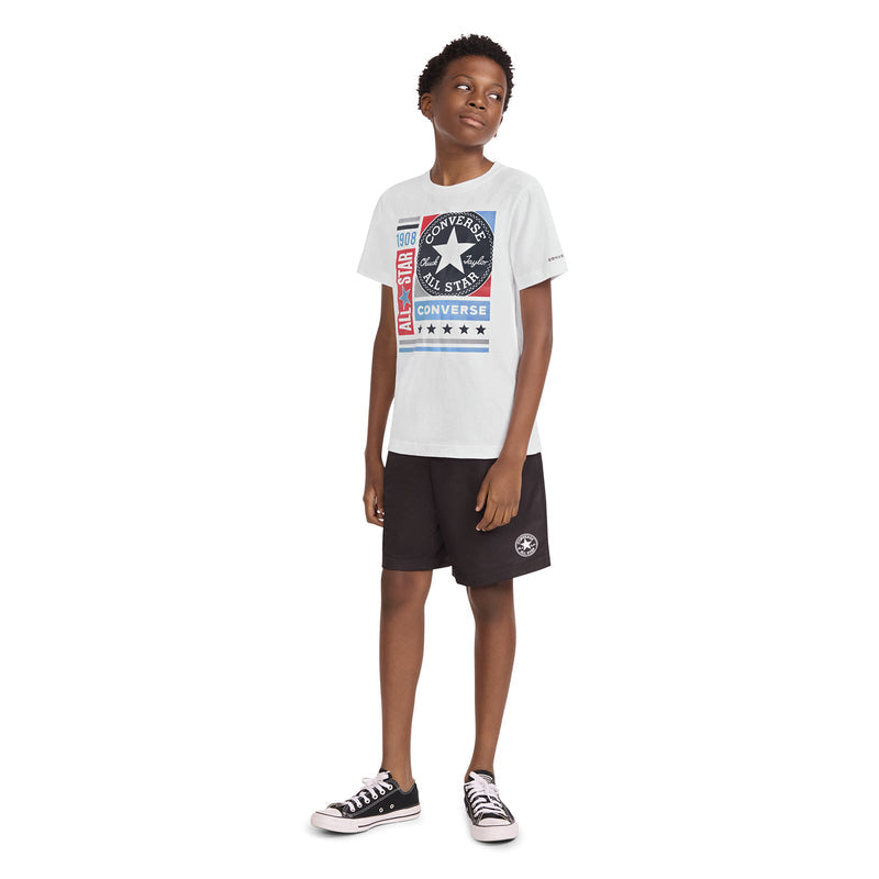Youth white Converse graphic T-shirt on child, side view with logo centered