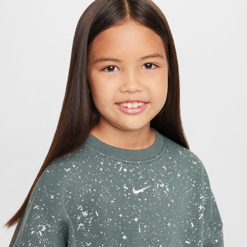 Youth crewneck sweatshirt close-up in vintage green with white speckle print and Nike swoosh