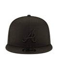 Black baseball cap with embroidered front logo and flat brim
